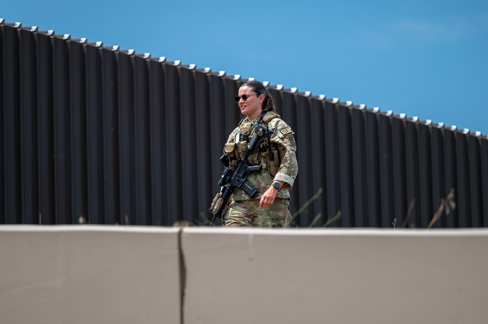 Staff Sgt. Makenna Glotfelty, an installation patrolman assigned to the 92nd Security Forces Squadron, patrols the perimeter of a facility during a no-notice Nuclear Operational Readiness Inspection at Fairchild Air Force Base, Washington, July 16, 2024. Air Mobility Command's Inspector General team conducted the no-notice NORI from July 16 - 18, during which the 92nd Air Refueling Wing and 141st ARW received same-day notification of the evaluation of the base's capability to perform as a nuclear support unit. Various capabilities at Fairchild AFB enable units to generate and provide, when directed, specially trained and equipped KC-135 Stratotanker aircrews to conduct critical air refueling of U.S. Strategic Command-assigned nuclear-capable bombers and Nuclear Command, Control and Communication aircraft. No-notice inspections validate that Airmen are always postured and ready with a credible force to assure, deter and defend in an increasingly complex security environment. No-notice and limited-notice operational readiness assessments and inspections directly support the plans unveiled by senior Department of the Air Force leaders as the force reoptimizes for Great Power Competition. (U.S. Air Force photo by Airman 1st Class Stassney Davis)