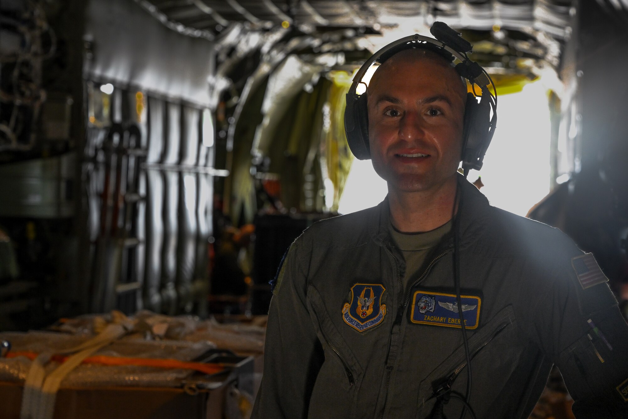 Maj. Zachary Eberle, 910th Operations Group pilot, poses for a photo prior to takeoff on the new C-130J-30 Super Hercules at the Lockheed Martin production facility, Marietta, Georgia, July 16, 2024.