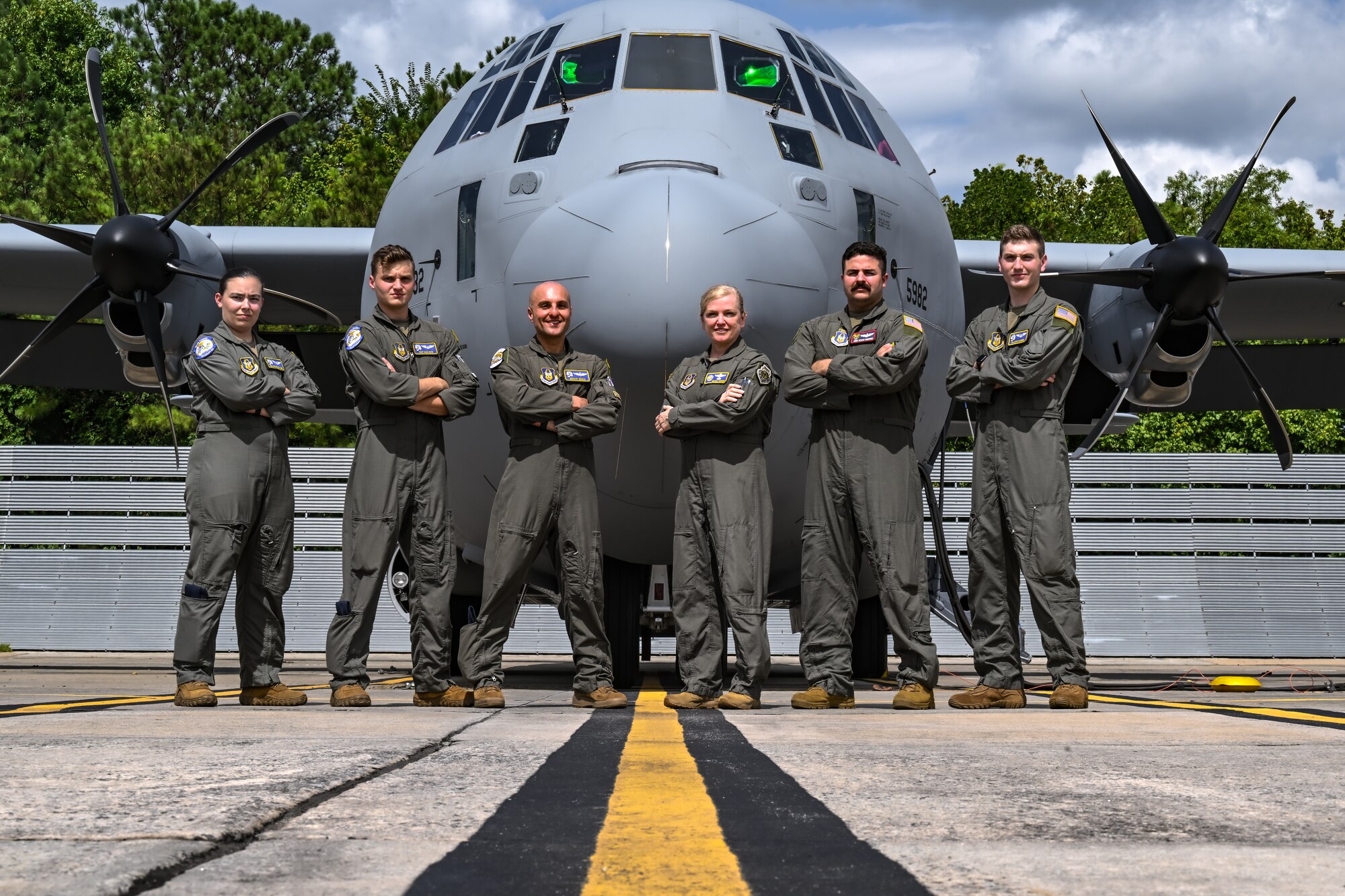 Maj. Gen. Melissa Coburn, 22nd Air Force commander, and 910th Operations Group aircrew pose for a photo during the key ceremony for the new C-130J-30 Super Hercules at the Lockheed Martin production facility, Marietta, Georgia, July 16, 2024.