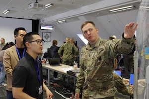 More than 250 data scientists, coders and developers referred to as “hackers,” gathered to develop prototypes within set timeframes to initiate and validate innovative concepts in Stuttgart Germany, June 7, 2024. BRAVO Hackathons, sponsored by senior Department of Defense leaders, foster innovative environments where government and industry collaborate to test bold ideas using real DOD data.