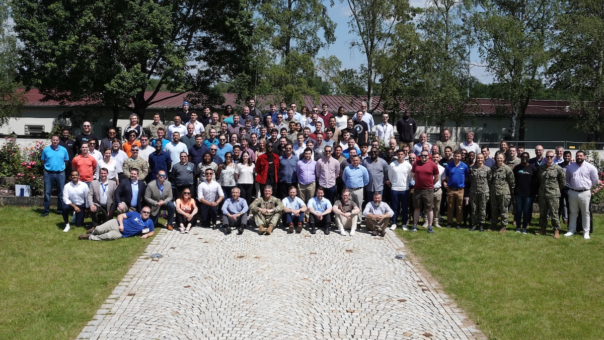More than 250 Department of Defense civilian and military data scientists, coders and developers pose for a group photo after the completion of the U.S. European Command BRAVO 101 Hackathon in Stuttgart, Germany, June 7, 2024. BRAVO Hackathons, sponsored by senior DOD leaders, foster innovative environments where government and industry collaborate to test bold ideas using real DOD data.