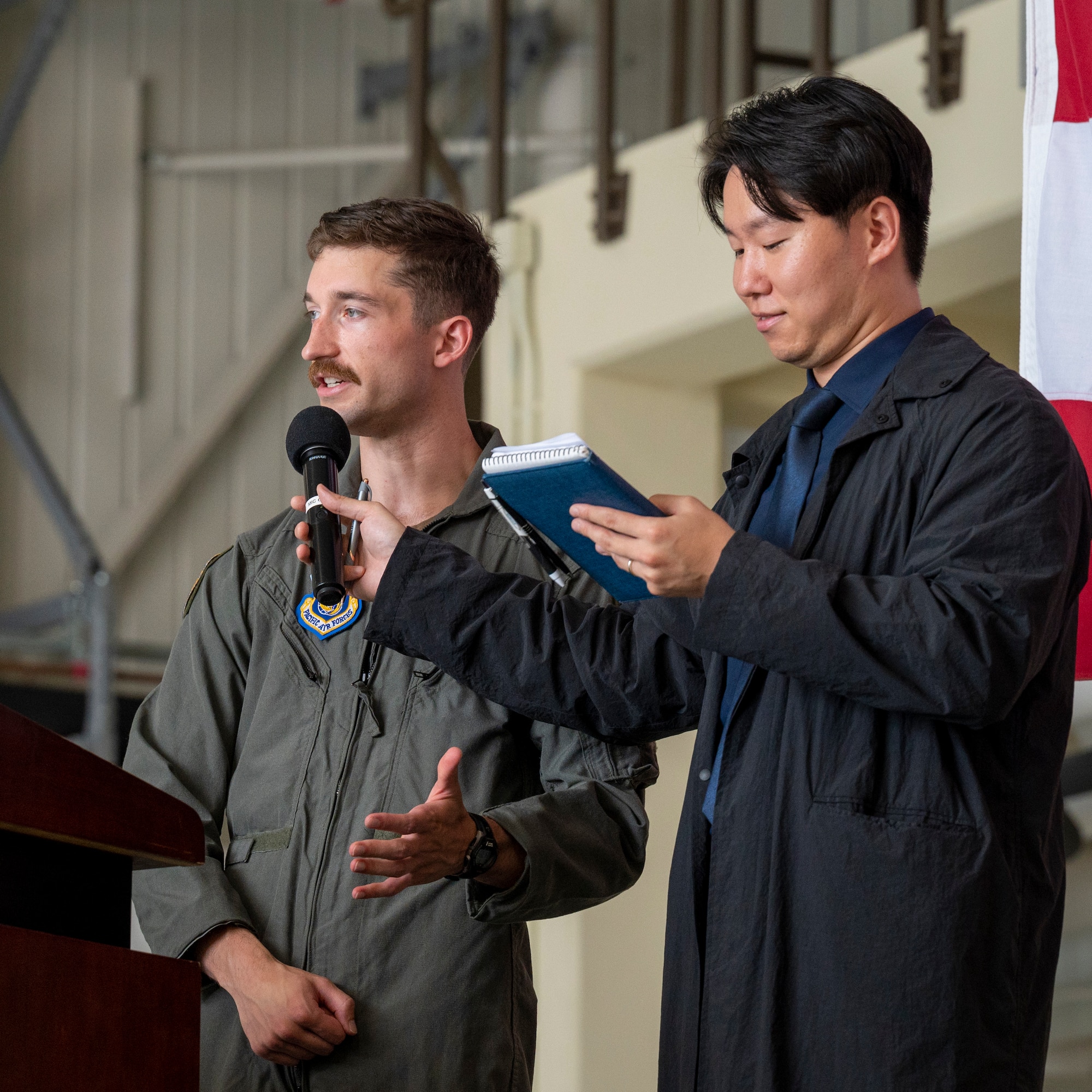 U.S. Air Force Capt. Alex Drummond, 36th Fighter Squadron F-16 Fighting Falcon pilot, shares the 36th FS aviation history with the assistance of Kim, Dae-Hwan, 51st Fighter Wing public affairs specialist and interpreter, during Pilot’s Day at Osan Air Base, Republic of Korea, July 17, 2024. In response to the Korean War, the ROK traveled to coalition bases to acquire P-51 Mustangs with the support of the U.S. (U.S. Air Force photo by Senior Airman Sabrina Fuller-Judd)