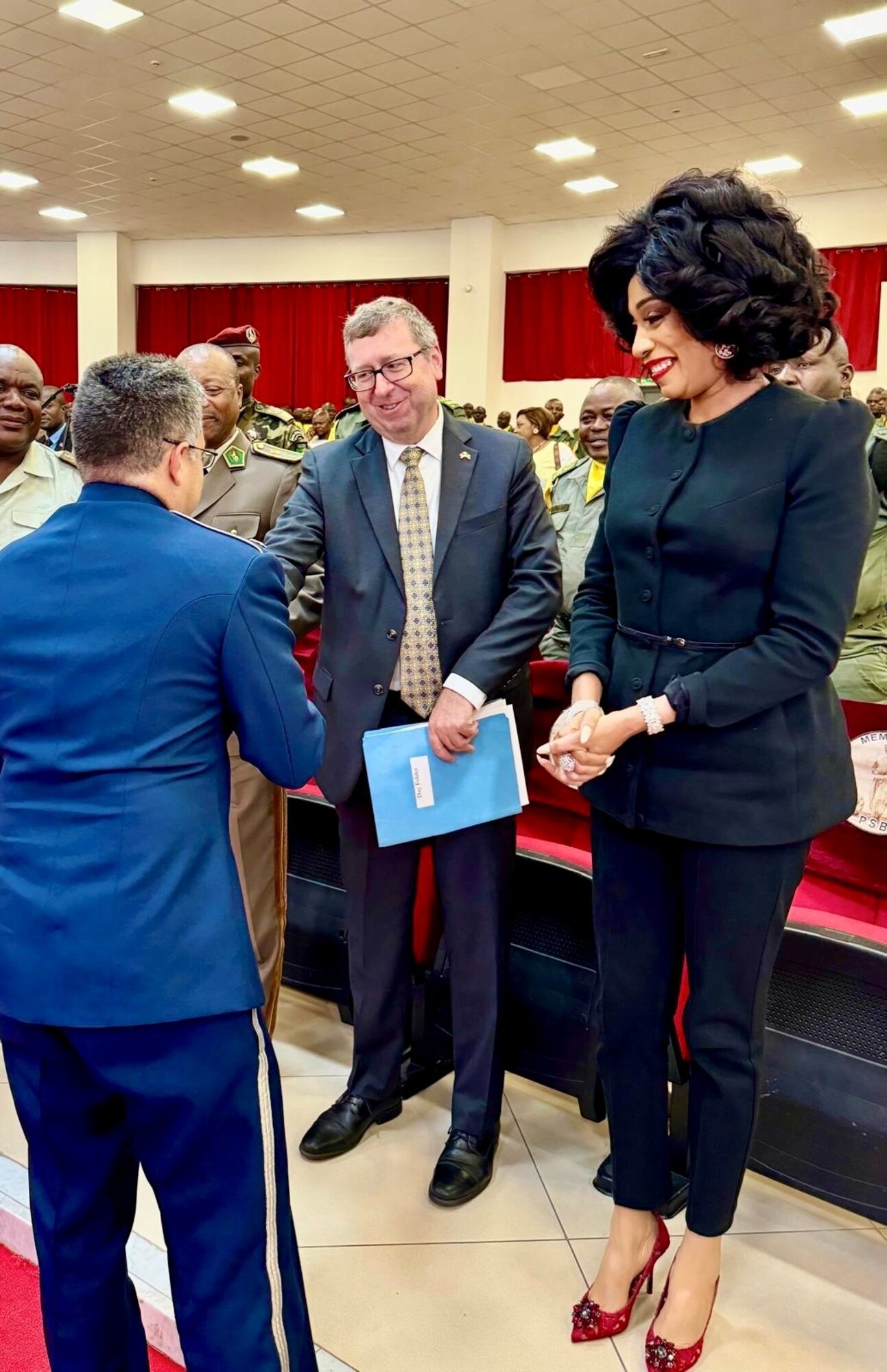 After the joint performance at the Memorial Pierre Savorgnan de Brazza, Lt. Col. Rafael Toro-Quiñones, commander, U.S. Air Forces in Europe-Air Forces Africa Band, shake hands with U.S. Ambassador to Congo Eugene Young and the director of the memorial, Belinda Ayesse. The USAFE-AFAFRICA Band serves as a bridge to increase cultural ties and enrich the partnerships between the U.S. and Republic of the Congo through music. (U.S. Air Force photo by 2Lt Jay Sconyers)