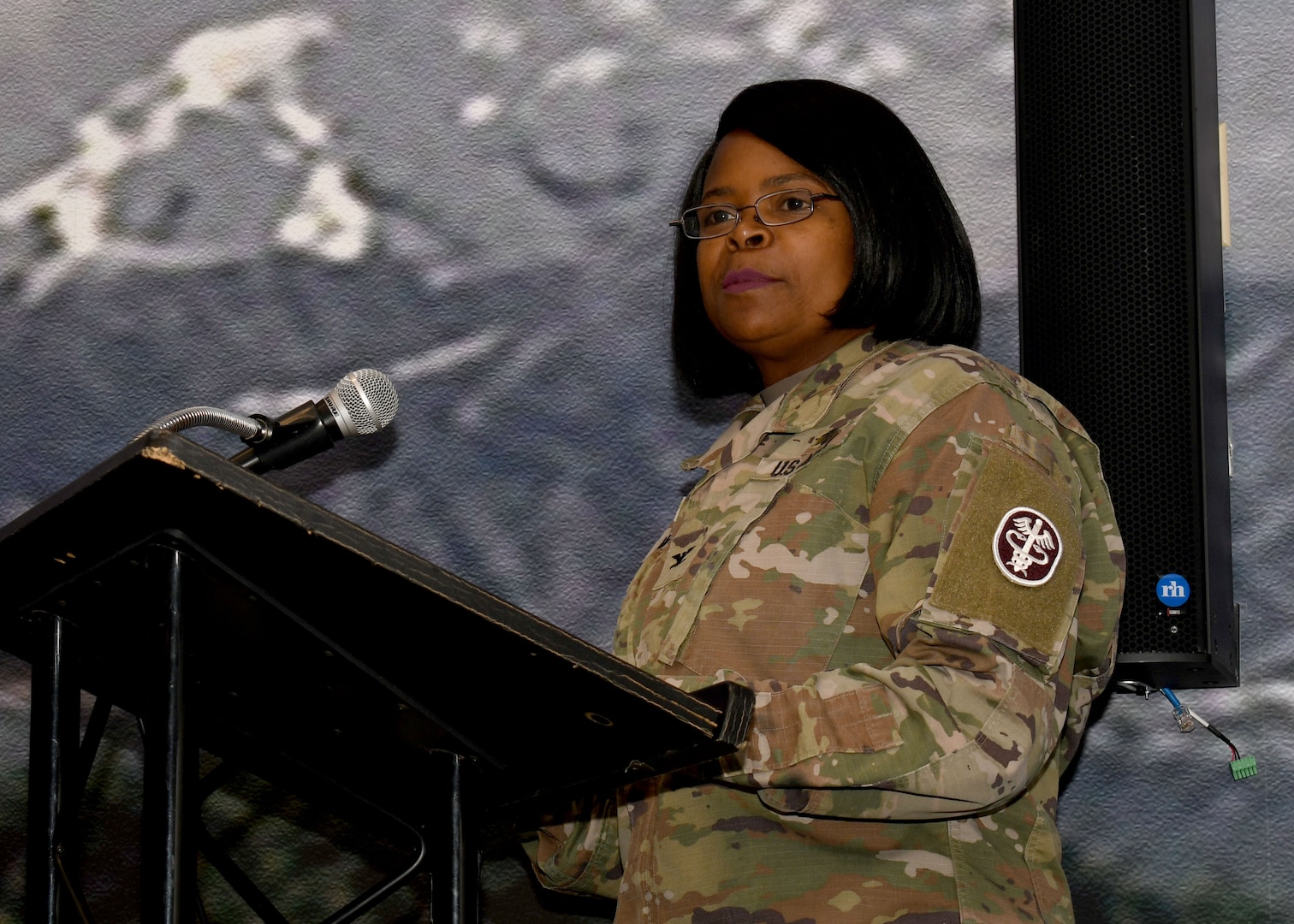 Photo of Col. Tawanna M. McGhee-Thondique, commander of the Dental Health Command-East, giving a speech during the Fort Drum DENTAC change of command ceremony.