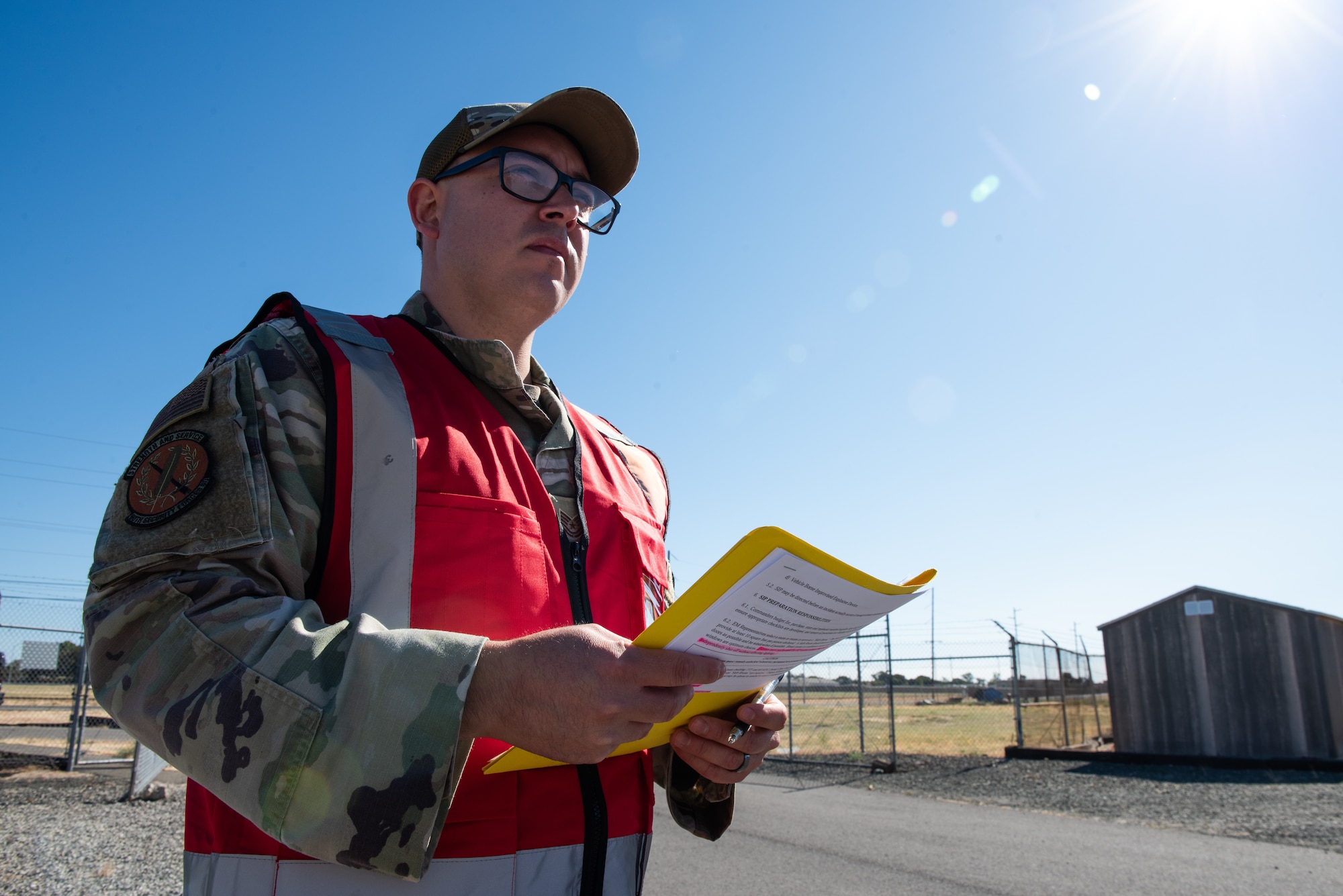 Airmen evaluates security forces personnel during exercise.
