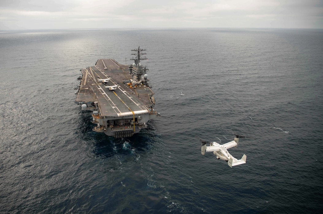 A CMV-22B Osprey from the "Sunhawks" of Fleet Logistics Multi-Mission Squadron (VRM) 50 prepares to land on the flight deck of the aircraft carrier USS Nimitz (CVN 68), July 17, 2024, in the Pacific Ocean.