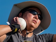 U.S. Army veteran Gabi Cha participates in the seated shot put at field practice during the 2024 Department of Defense Warrior Games