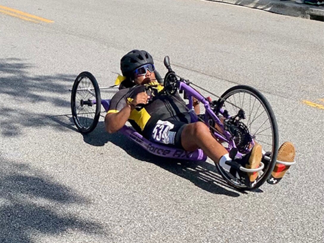 Spc. (R) Corine Hamilton competes in hand cycling at the 2024 Department of Defense Warrior Games