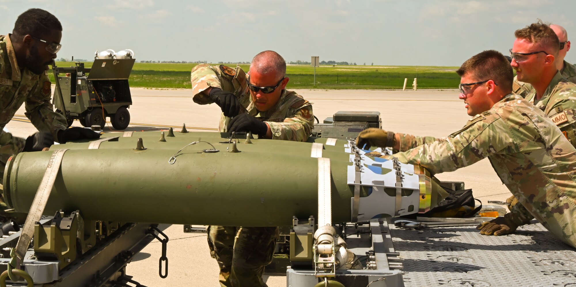 Airmen assigned to the 5th Munitions Squadron compete in the 5th Maintenance Group’s inaugural Mission Generation Competition at Minot Air Force Base, North Dakota, July 17, 2024. This event aimed to demonstrate and evaluate proficiencies by incorporating urgency and fostering spirited competition among various units.