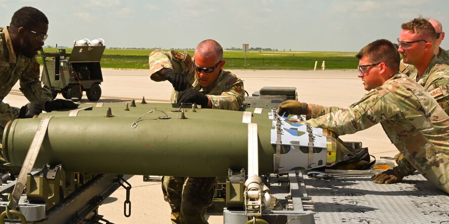 Airmen assigned to the 5th Munitions Squadron compete in the 5th Maintenance Group’s inaugural Mission Generation Competition at Minot Air Force Base, North Dakota, July 17, 2024. This event aimed to demonstrate and evaluate proficiencies by incorporating urgency and fostering spirited competition among various units.