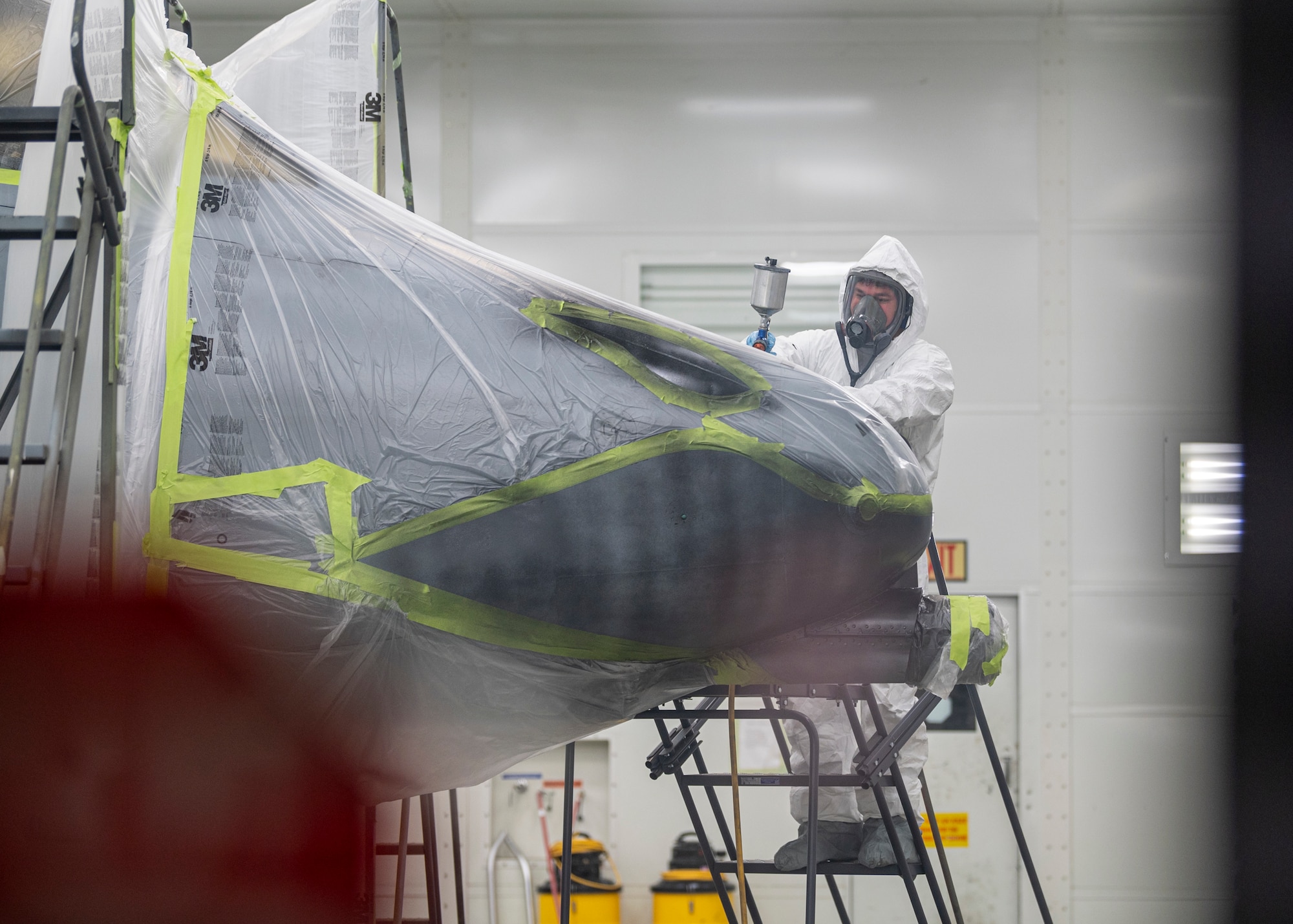 An U.S. Air Force Airman assigned to the 23rd Maintenance Squadron begins painting the nose art onto an A-10C Thunderbolt II at Moody Air Force Base, Georgia, July 17, 2024. Throughout this repainting process painting the nose art was done in several steps that utilized a slew of different paints over multiple days – allowing the paint to cure between coats. (U.S. Air Force photo by Airman 1st Class Leonid Soubbotine)