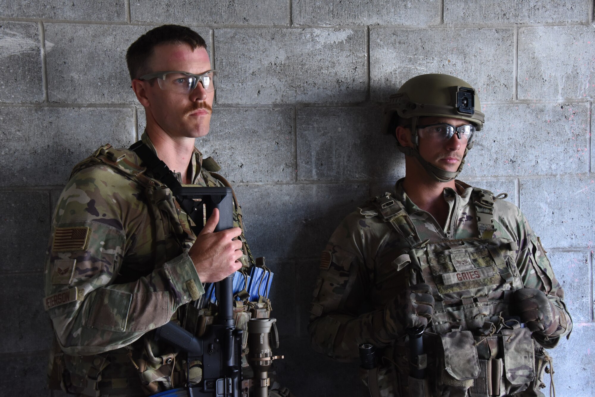 enior Airman Tyler Peterson and Senior Airman Kolby Gries, 185th Air Refueling Wing Security Forces, stand in a rest area