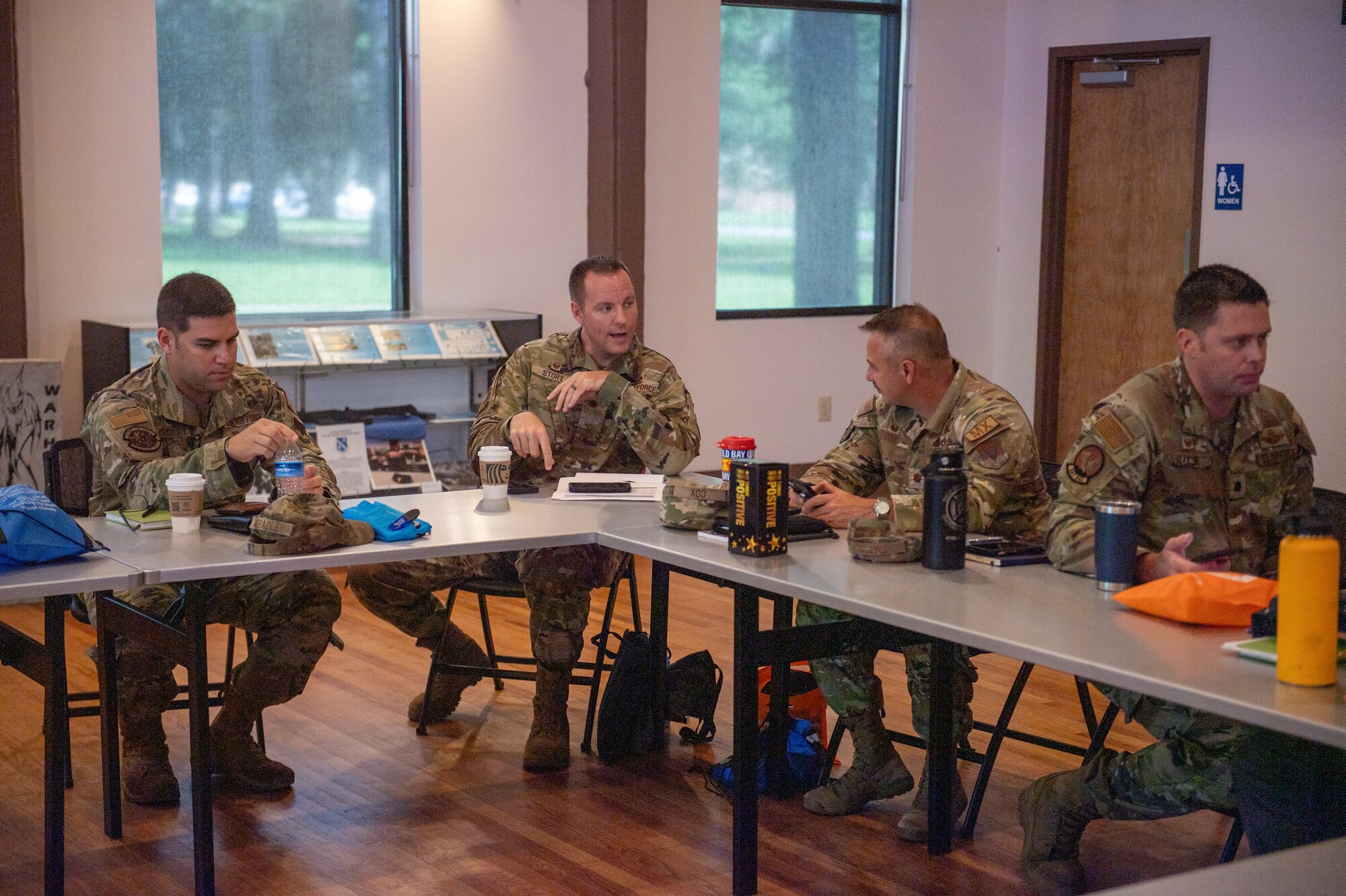 U.S. Air Force squadron commanders assigned to the 23rd Wing discuss topics from the class during an annual Squadron Commander’s Course at Moody Air Force Base, Georgia, July 18, 2024.This course is held annually to ensure squadron commanders are equipped with installation resource knowledge, while enhancing leadership skills and bonds with other commanders across the base. (U.S. Air Force photo by Airman 1st Class Cade Ellis)