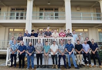 wenty-eight ASC [formerly known as the Australian Submarine Corporation] personnel pose for a photo at Pearl Harbor Naval Shipyard and Intermediate Maintenance Facility (PHNSY & IMF), Joint Base Pearl Harbor-Hickam, Hawaii, July 16, 2024.