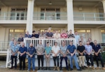 wenty-eight ASC [formerly known as the Australian Submarine Corporation] personnel pose for a photo at Pearl Harbor Naval Shipyard and Intermediate Maintenance Facility (PHNSY & IMF), Joint Base Pearl Harbor-Hickam, Hawaii, July 16, 2024.