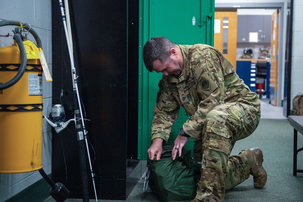 photo of Col. Sheets getting ready to fly