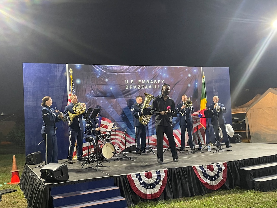 U.S. Air Forces in Europe-Air Forces Africa Band brass quintet “Five Star Brass” performs with Congolese artist and influencer Wayé at the U.S. Embassy Brazzaville Independence Day reception. The USAFE-AFAFRICA Band serves as a bridge to increase cultural ties and enrich the partnerships between the U.S. and Republic of the Congo through music. (U.S. Air Force photo by Dominik Halnais)