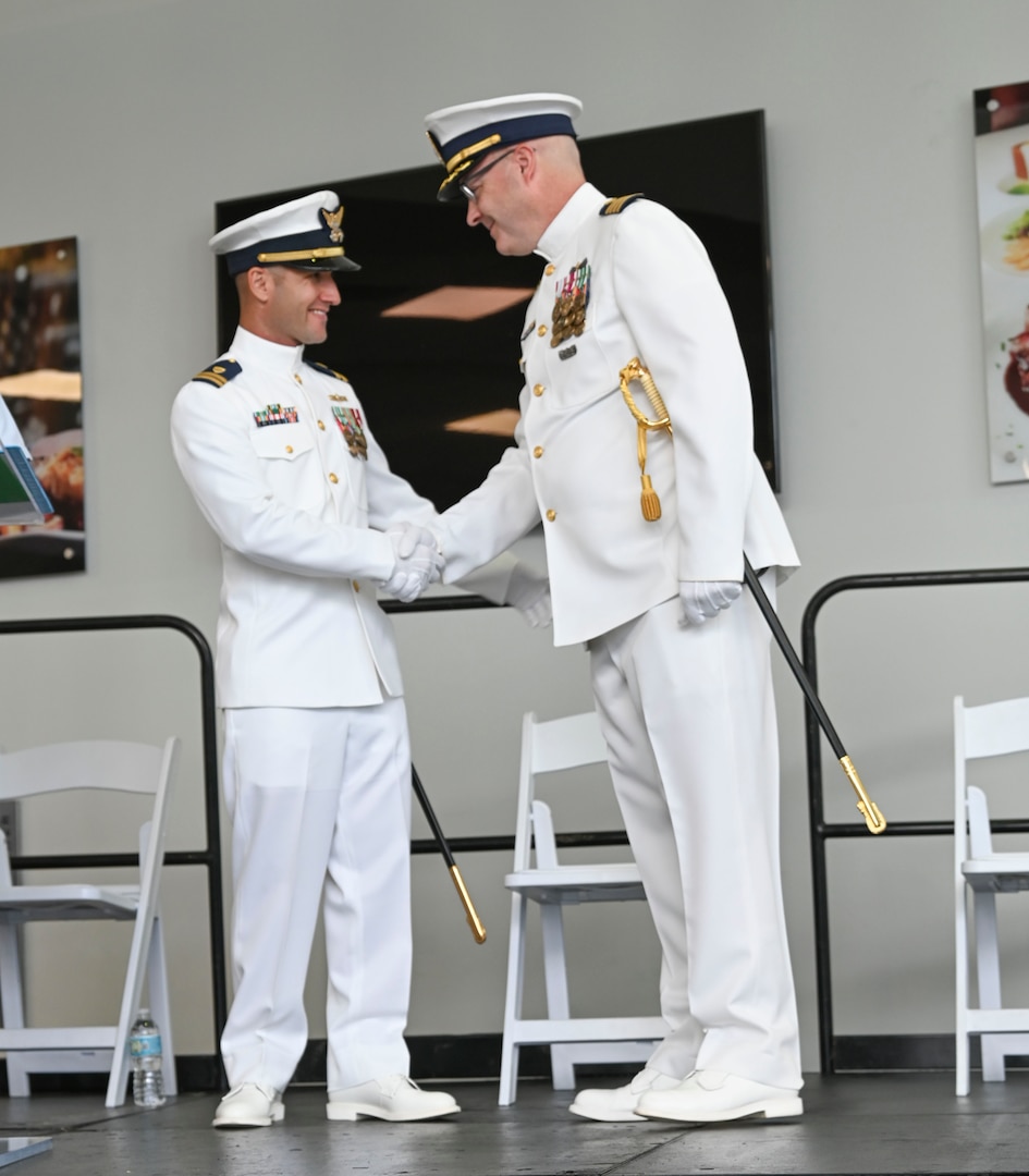 Lt. Giacomo Terrizzi III, commanding officer of Marine Safety Unit Lake Worth, greets Capt. Chris Cederholm, Coast Guard Sector Miami commander, during a commissioning ceremony for Marine Safety Unit Lake Worth held at Port of Palm Beach, Florida, July 19, 2024. The ceremony established MSU Lake Worth as one of 18 marine safety units in the Coast Guard to have a junior officer in command. (U.S. Coast Guard photo by Petty Officer Eric Rodriguez)