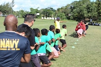 PORT VILA, Vanuatu (July 18, 2024) – Service members play tug of war with students at the Kawenu Primary School, during a community outreach event as part of Pacific Partnership 24-2 in Port Vila, Vanuatu, July 18, 2024. Pacific Partnership the U. S. Navy's largest humanitarian and civic assistance mission with partner-nations, non-governmental organizations and other government agencies to execute a variety of humanitarian civic action missions across the Indo-Pacific. The annual mission is designed to strengthen relationships and improve U.S. and partner-capacity to deliver humanitarian assistance and disaster-relief preparedness. (U.S. Navy photo by Mass Communication Specialist 1st Class Ryan D. McLearnon/Released)