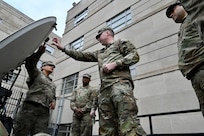 Members of the District of Columbia National Guard’s G-6 familiarize themselves with the set up and tear down of the dish portion of the Joint Incident Site Communication Capability (JISCC) system at the D.C. Armory, April 6, 2024. The training was part of a large-scale communications exercise (COMMEX).