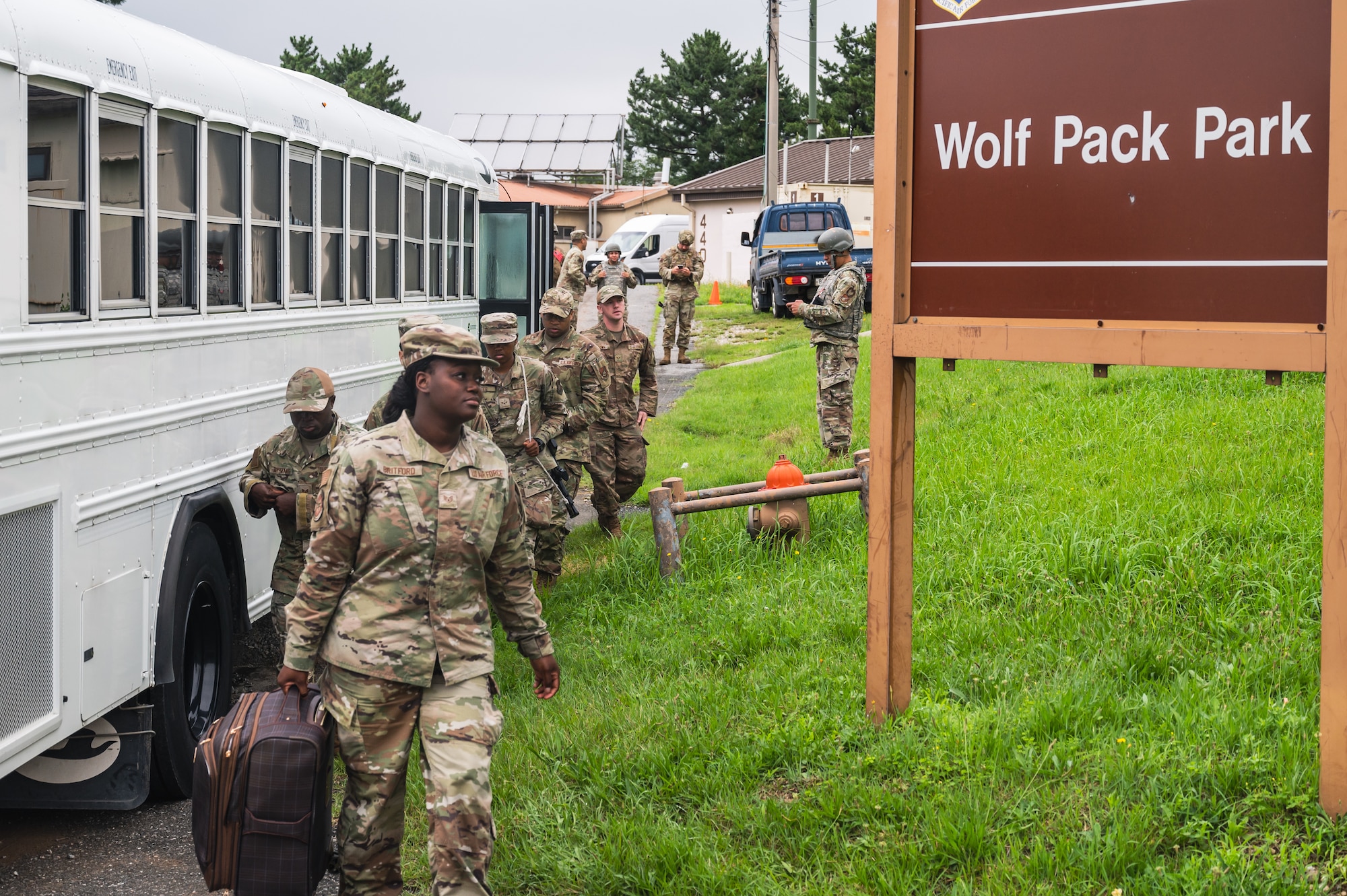 Airmen assigned to the 8th Fighter Wing exit a bus during exercise Beverly Sentinel 24-2 at Kunsan Air Base