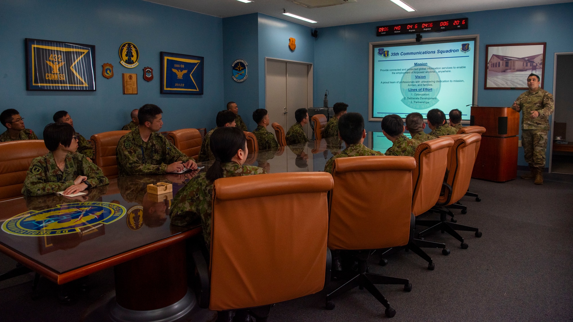 Japan Ground Self-Defense Force soldiers receive a brief about the 35th Communications Squadron during a JGSDF Basic English Training Course tour at Misawa Air Base, Japan, July 18, 2024.