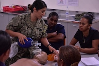 PORT VILA, Vanuatu (July 16, 2024) U.S. Navy Lt. Maribel Tatunay right, of Moreno Valley, Calif., and Lt. j.g. Chisato Ishikawa, of the Japanese Maritime Self-Defense Force, give a basic lifesaving class to Port Vila Central Hospital staff in support of Pacific Partnerships 24-2. Pacific Partnership the U. S. Navy's largest humanitarian and civic assistance mission with partner-nations, non-governmental organizations and other government agencies to execute a variety of humanitarian civic action missions across the Indo-Pacific. The annual mission is designed to strengthen relationships and improve U.S. and partner-capacity to deliver humanitarian assistance and disaster-relief preparedness. (U. S. Army photo by Civil Affairs Specialist Sgt. Jaron Nigoza)