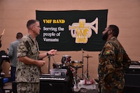 PORT VILA, Vanuatu (July 17, 2024) Master Chief Musician Guy Gregg (left), of Queen Creek, Ariz., with Bandmaster Sergeant William Roy Tom (right) of the Vanuatu Mobile forces band, discussing the specifics of the musical accompaniment for a ceremony during Pacific Partnership 24-2. Pacific Partnership is the U. S. Navy's largest humanitarian and civic assistance mission with partner-nations, non-governmental organizations and other government agencies to execute a variety of humanitarian civic action missions across the Indo-Pacific. The annual mission is designed to strengthen relationships and improve U.S. and partner-capacity to deliver humanitarian assistance and disaster-relief preparedness. (U. S. Army photo by Civil Affairs Specialist Sgt. Jaron Nigoza)