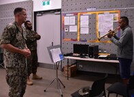 PORT VILA, Vanuatu (July 17, 2024) Master Chief Musician Guy Gregg (left), of Queen Creek, Ariz., with Bandmaster Sgt. William Roy Tom (middle) of the Vanuatu Mobile Forces Band (VMFB), and Lance Cpl. Vuti Bong (right), of the VMFB, rehearse the musical accompaniment for a ceremony during Pacific Partnership 24-2. Pacific Partnership is the U. S. Navy's largest humanitarian and civic assistance mission with partner-nations, non-governmental organizations and other government agencies to execute a variety of humanitarian civic action missions across the Indo-Pacific. The annual mission is designed to strengthen relationships and improve U.S. and partner-capacity to deliver humanitarian assistance and disaster-relief preparedness. (U. S. Army photo by Civil Affairs Specialist Sgt. Jaron Nigoza)