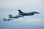 240719-N-N0824-1001 PHILIPPINE SEA (July 19, 2024) - 
Two U.S. Navy E/A 18-G Growlers and one Japanese Air Self-Defense Force F-2 fly in formation during a French PEGASE mission for an aerial interaction, July 19, 2024. U.S. 7th Fleet is the U.S. Navy's largest forward-deployed numbered fleet, and routinely interacts and operates with allies and partners in preserving a free and open Indo-Pacific region. (Courtesy Photo)