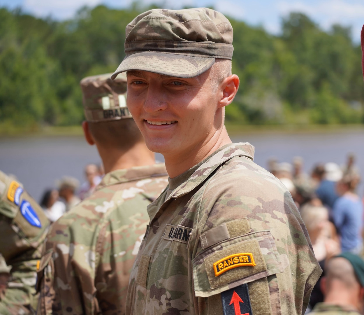 Pfc. Chase Cammanga smiles during his graduation ceremony from Army Ranger School June 21, 2024. Cammenga is the first Michigan Army National Guard Soldier to complete the Ranger Team Leader Initiative training program for enlisted Soldiers in the Army National Guard who aspire to attend Ranger School.