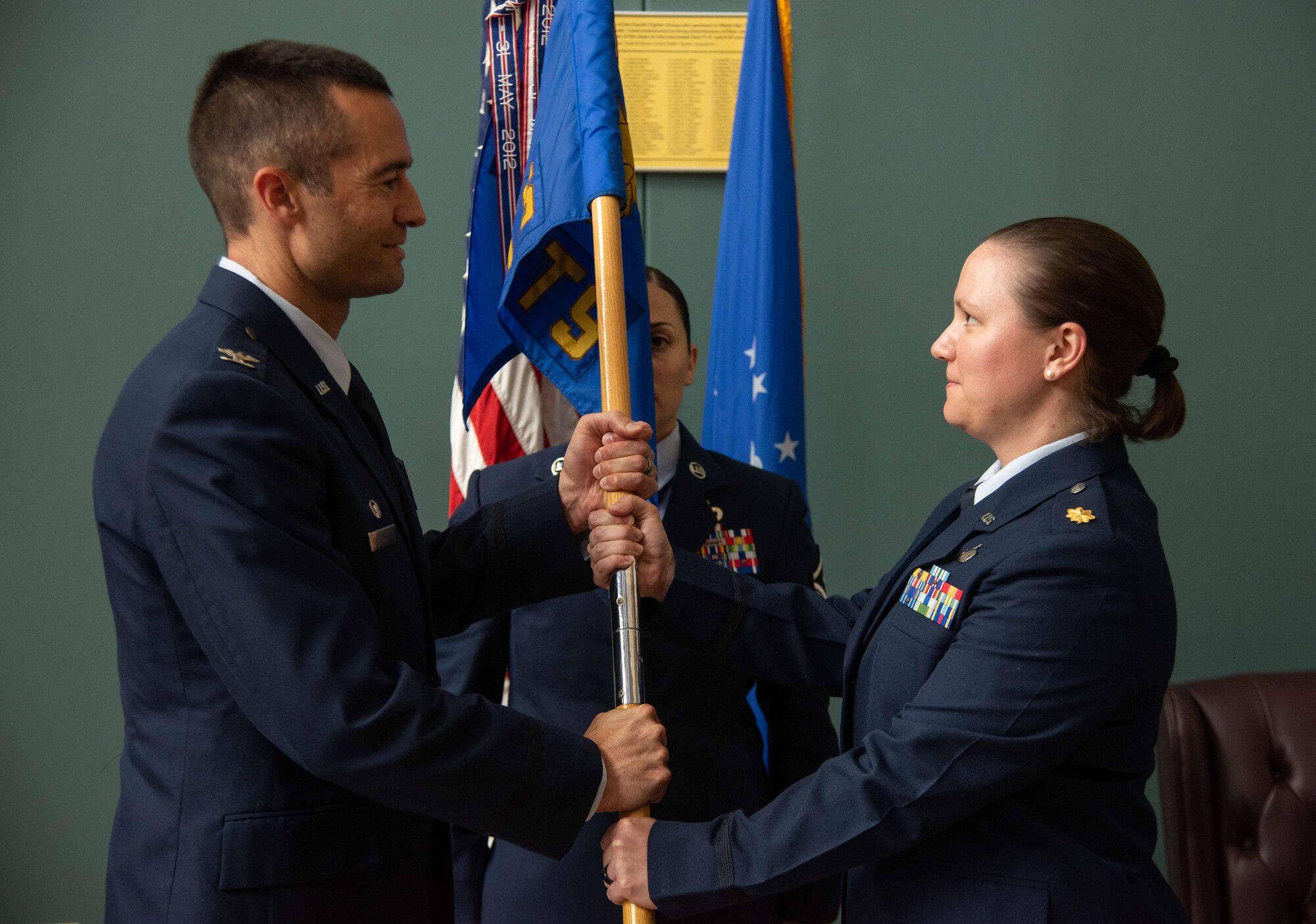 U.S. Air Force Airmen assigned to the 4th Comptroller Squadron render a first salute to U.S. Air Force Maj. Amy Bragg, 4th CPTS incoming commander, during a change of command ceremony at Seymour Johnson Air Force Base, North Carolina, June 28, 2024. During the ceremony, U.S. Air Force Maj. Aleksi Vega relinquished command of the 4th CPTS to Bragg. Change of command ceremonies are rooted in military history dated back to the 18th century and serves as an opportunity for members of the unit to witness their new leader assume the responsibility and trust associated with the position of commander.  (U.S. Air Force photo by Tech. Sgt. Christopher Hubenthal)