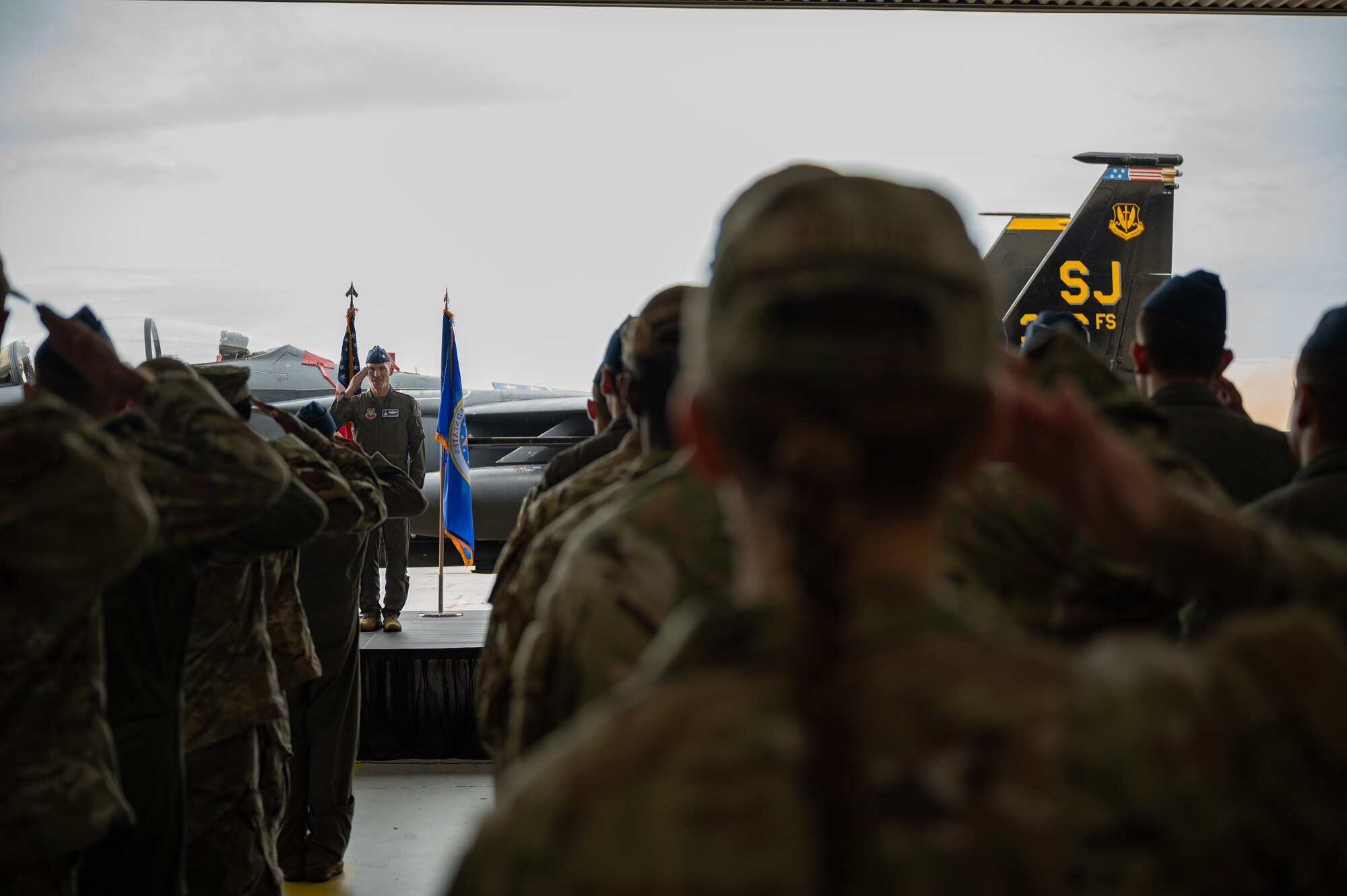 U.S. Air Force Col. Brian Novchich, 4th Operations Group incoming commander, renders his first salute to members of the 4th OG during an assumption of command ceremony at Seymour Johnson Air Force Base, North Carolina, July 12, 2024. The first salute represents the squadron welcoming a new commander. (U.S. Air Force photo by Senior Airman Rebecca Sirimarco-Lang)
