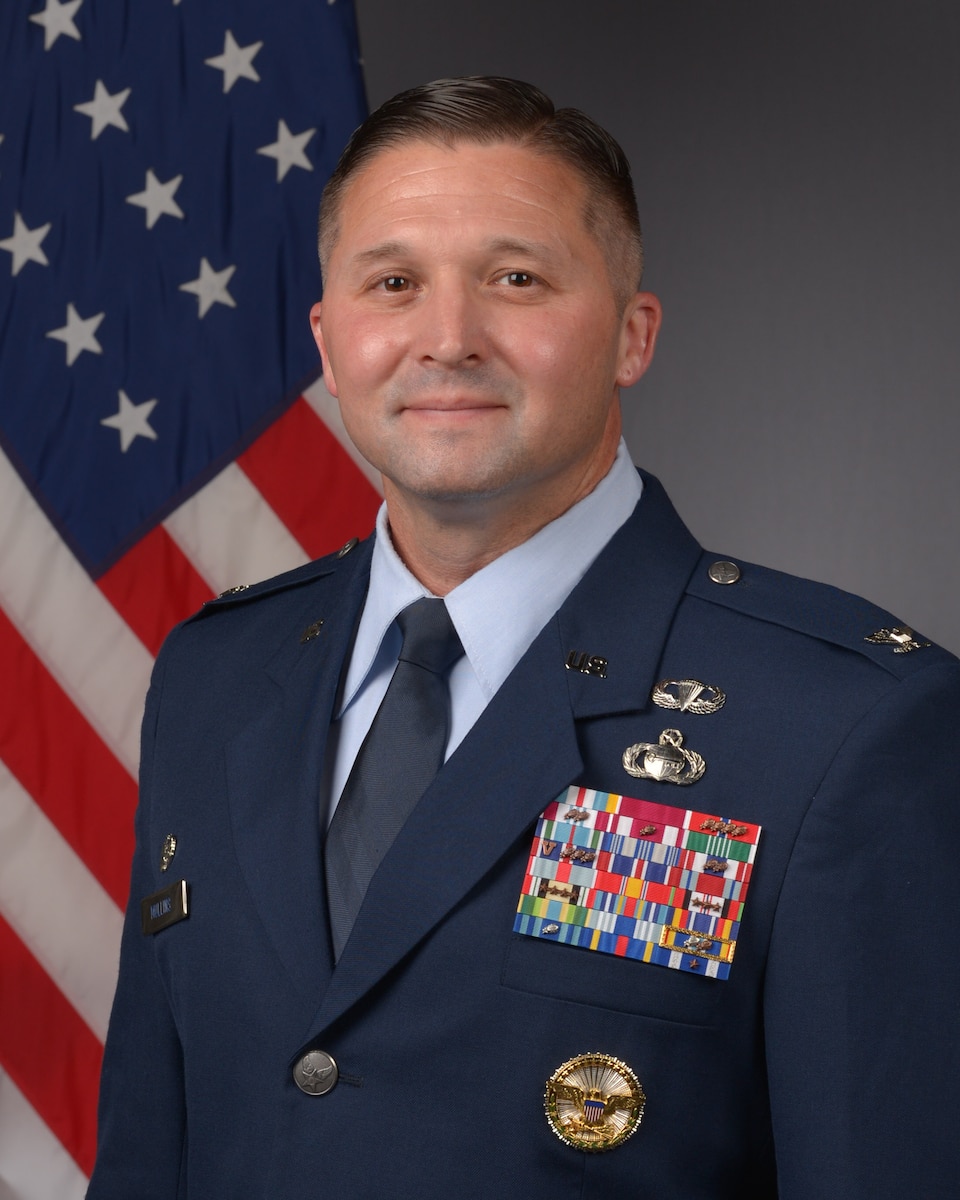Colonel in blues uniform.
