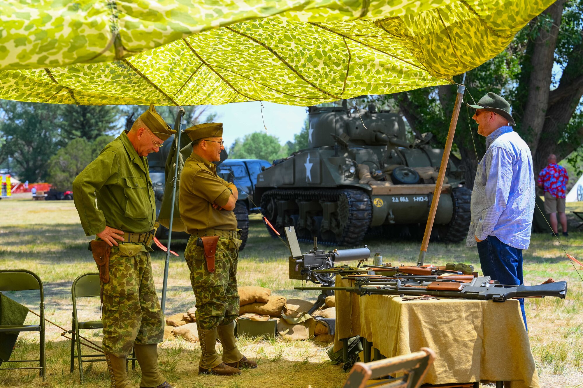 A Fort DA Russell Days booth with visitors.
