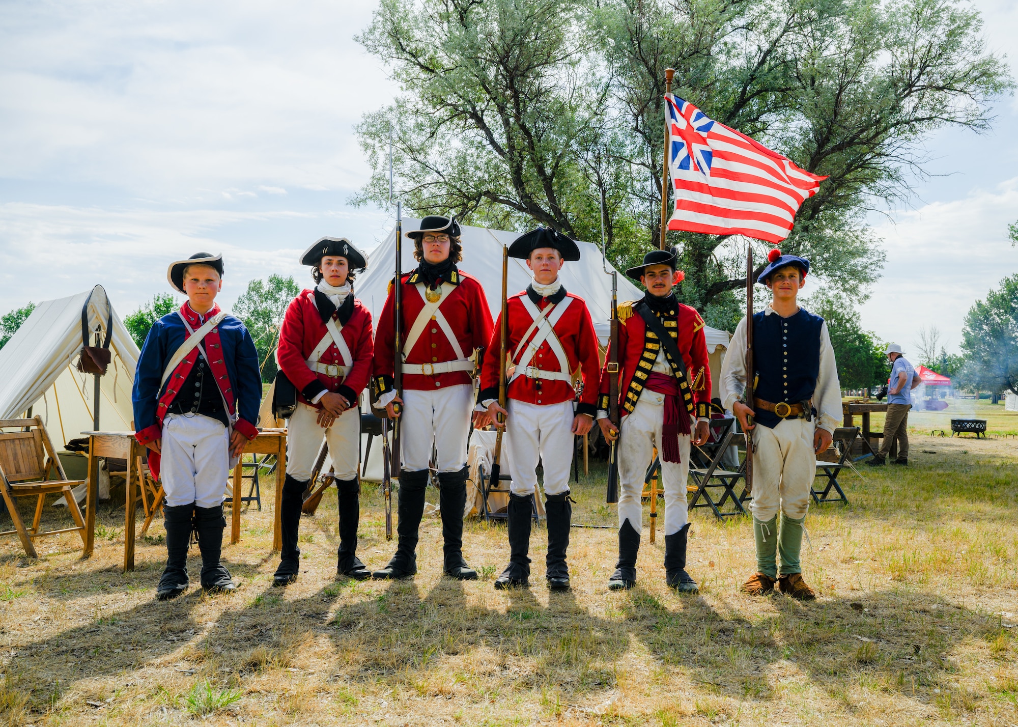 Historical reenactors pose for a photo.