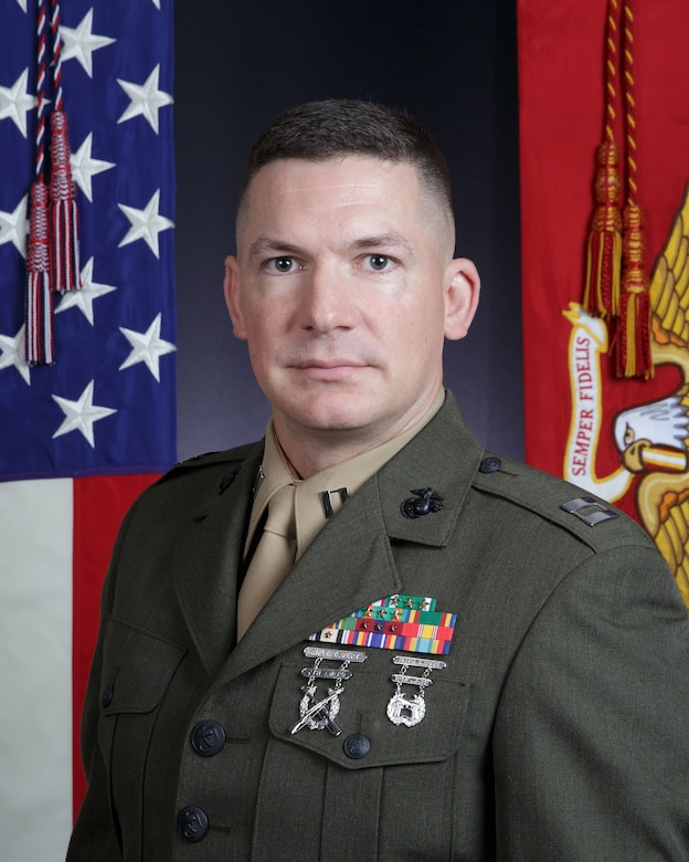 Bio picture with US and USMC display flag