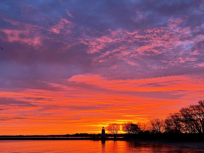 Purple and orange sunrise at Cheboygan River Crib Light, November 2022. First place winner in 2023 Detroit District photo contest. Photo by Jason O'Grady.