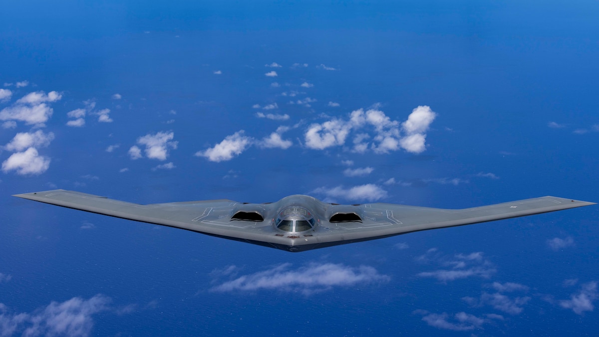 A U.S. Air Force B-2 Spirit bomber flies over the North Pacific Ocean, June 13, 2024. The speed, flexibility, and readiness of the Air Force's strategic bombers plays a critical role in deterring potential adversaries and signaling unwavering support to allies and partners. Counter-maritime missions provide valuable training opportunities to improve interoperability and demonstrate that Air Force forces are capable of operating anywhere, anytime, to meet any challenge decisively. (U.S. Marine Corps photo by Sgt. Jose Angeles)