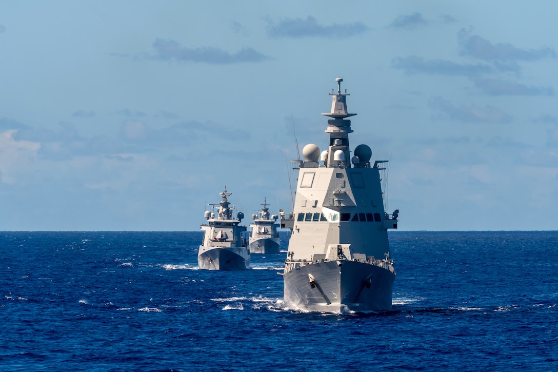 Royal Brunei Navy offshore patrol vessels KDB Darussalam (OPV 06) and KDB Darulaman (OPV 08) steam behind the Italian Navy offshore patrol vessel ITS Montecuccoli during tactical maneuvering exercises with U.S. Coast Guard Cutter Midgett at Exercise Rim of the Pacific 2024 off the coast of Hawaii, July 19.