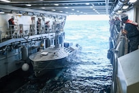 A Common Unmanned Surface Vehicle (CUSV), heads out to sea for the Poniard launching test from ROKS Cheon Ja Bong, 12 July.