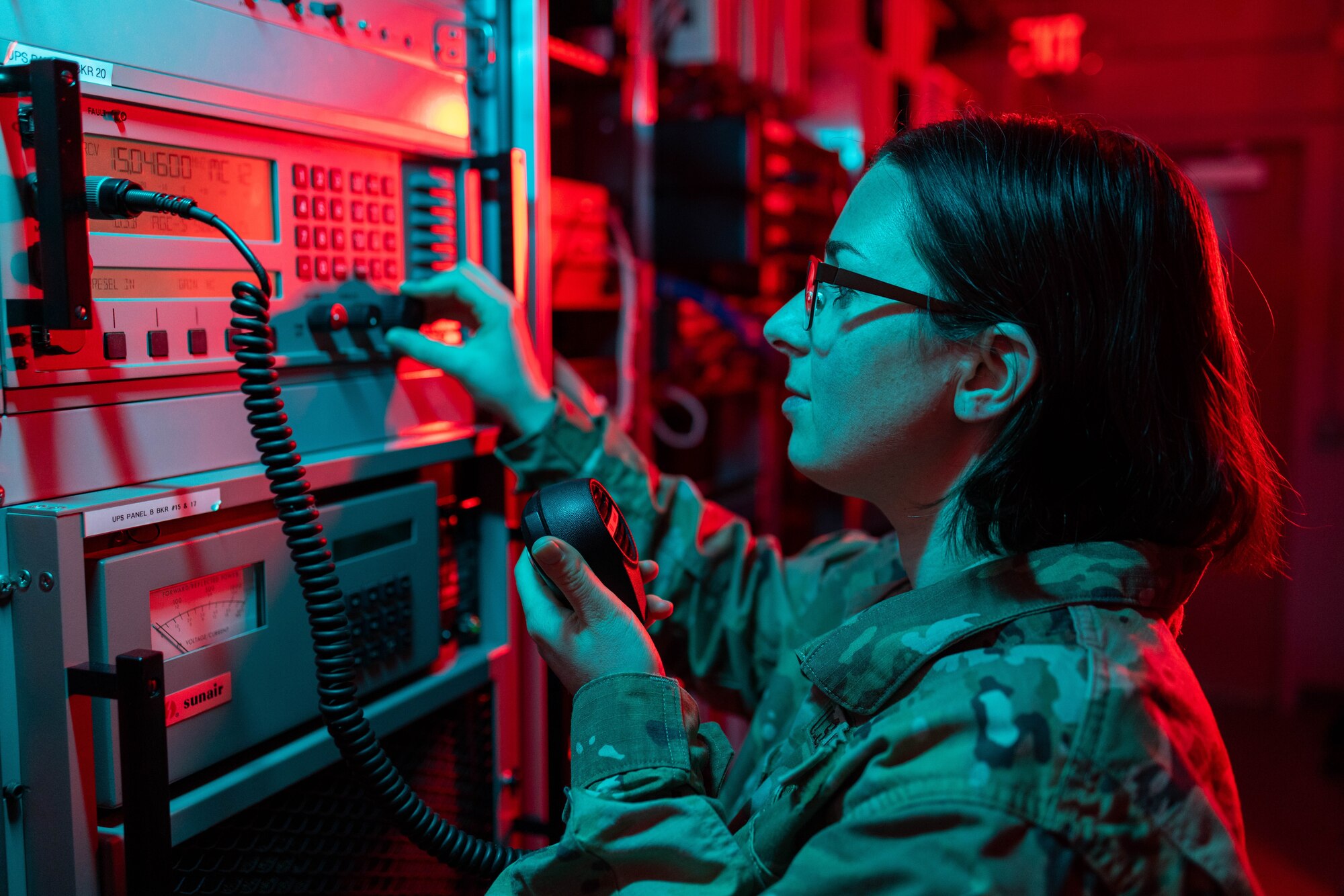 U.S. Air Force Master Sgt. Haley Rankin, 225th Air Defense Squadron weapons controller, illustrates how high frequency radios were used during exercise Noble Skywave inside the Western Air Defense Sector’s radio control room on Joint Base Lewis-McChord, Washington, May 30, 2024.  She was recognized for her excellence in leadership, job performance, and whole Airman concept by being award the Air National Guard’s 2024 Outstanding Non-Commissioned Officer of the Year.  (U.S.  Air National Guard photo by Tech. Sgt. Darby Arnold)