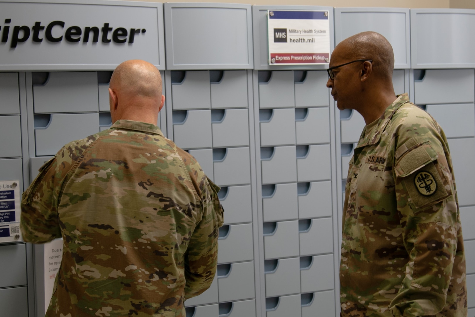 COL F. Cameron Jackson shows pharmacy Scripcenter to GEN James Mingus in recent visit to WACH