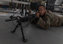 Spc. David Ballard, Assistant Team Leader, assigned to the 307th Chemical Company, 76 Operational Response Command, conducted firing drills to practice aiming, firing, and controlling the M249 while using a Virtual Battle Space, Synthetic Weapon Attachment (VBS SWA) system at the weapon's training during the Red Dragon 24 training at Dugway Proving Ground, Utah, on June 14, 2024. The VBS system provides real-time feedback to Soldiers on their movements, communication, and engagement techniques.