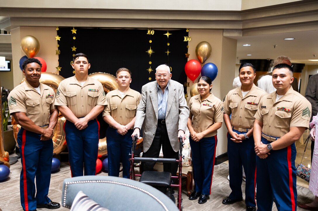 U.S. Marine Corps Corporal David S. Watkins, retired, celebrates his 100th birthday at the Five Star Premiere Residences of Dallas in Dallas, Texas on July 19, 2024. He was joined in celebration by the Marines belonging to the 8th Marine Corps District located in Forth Worth, Texas. Watkins is a World War II veteran and has served in various campaigns in countries that include Guam, Philippines, Japan, and the Marshall Islands.  Being a tanker he displayed an overwhelming amount of courage and endured hardships to serve his country. (U.S. Marine Corps photo by Cpl. Zachary Foshee)
