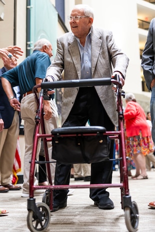U.S. Marine Corps Corporal David S. Watkins, retired, celebrates his 100th birthday at the Five Star Premiere Residences of Dallas in Dallas, Texas on July 19, 2024. He was joined in celebration by the Marines belonging to the 8th Marine Corps District located in Forth Worth, Texas. (U.S. Marine Corps photo by Sgt. Webster Rison)