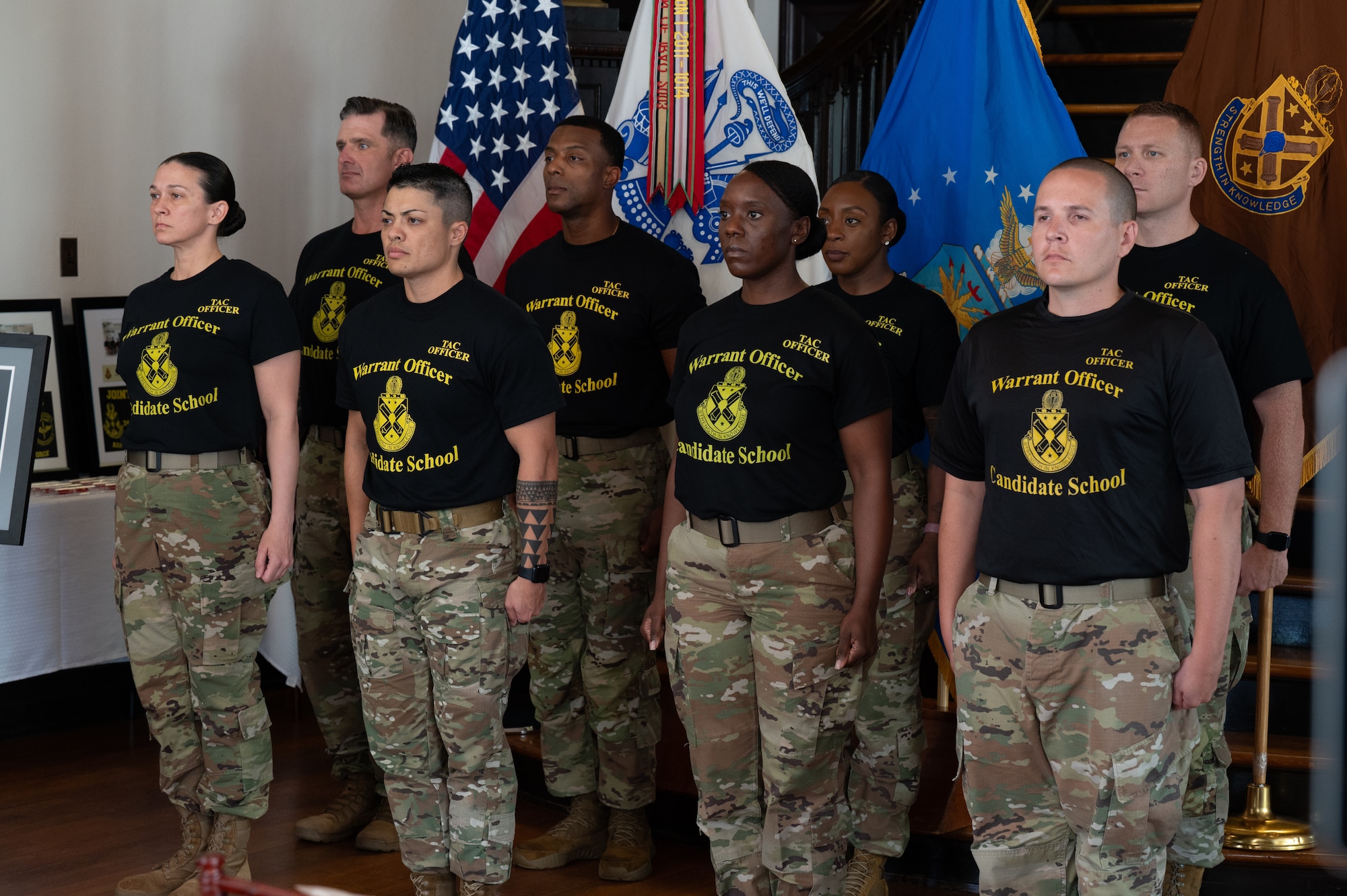 Graduates of the Train, Advise and Counsel Officer Certification Course, recite the TAC Officer Creed during a graduation ceremony at the Holman House in Ozark, Alabama, July 19, 2024. The knowledge and skills acquired by the graduating Airmen are set to revolutionize the curriculum at the new U.S. Air Force Warrant Officer School. (U.S. Air Force photo by Senior Airman Evan Porter)