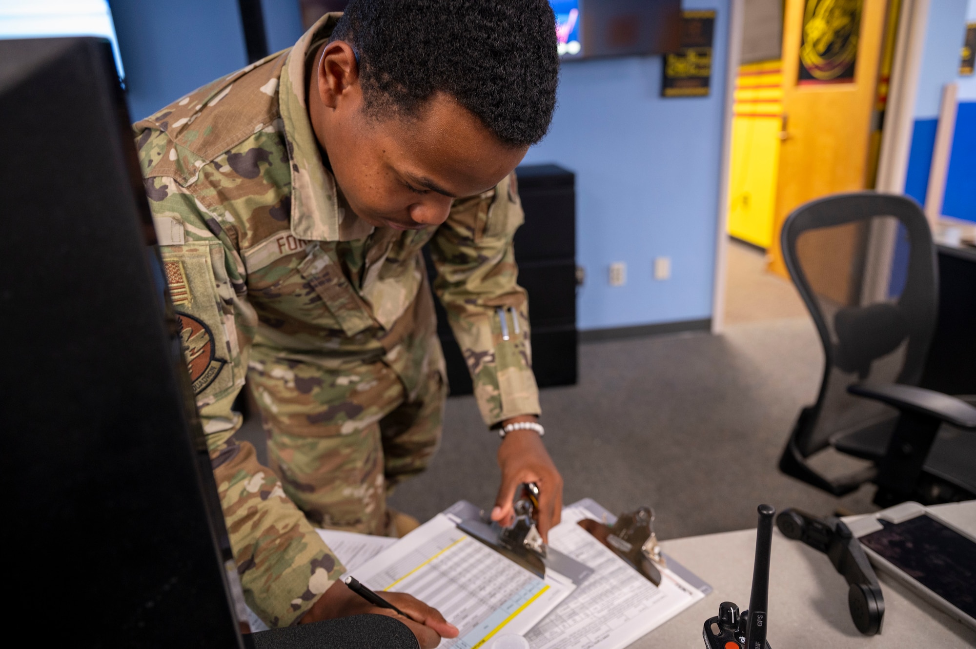 U.S. Air Force Airman Amari Ford, 314th Fighter Squadron aviation resource management apprentice, documents maintenance status codes at Holloman Air Force Base, New Mexico, July 15, 2024.
