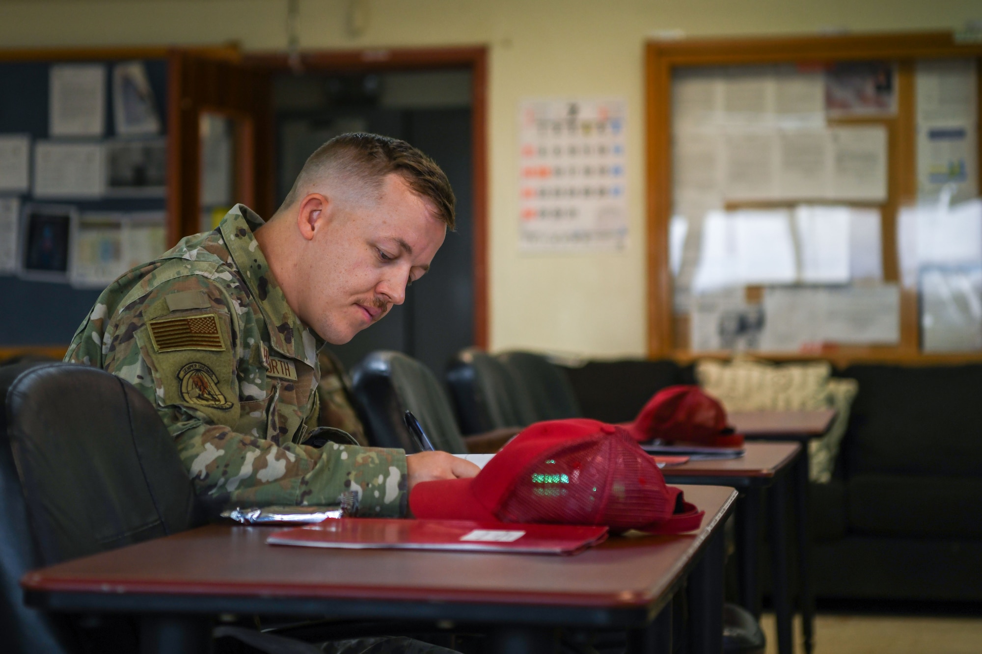 An Airman conducts a Backflow Prevention Course progress check test.