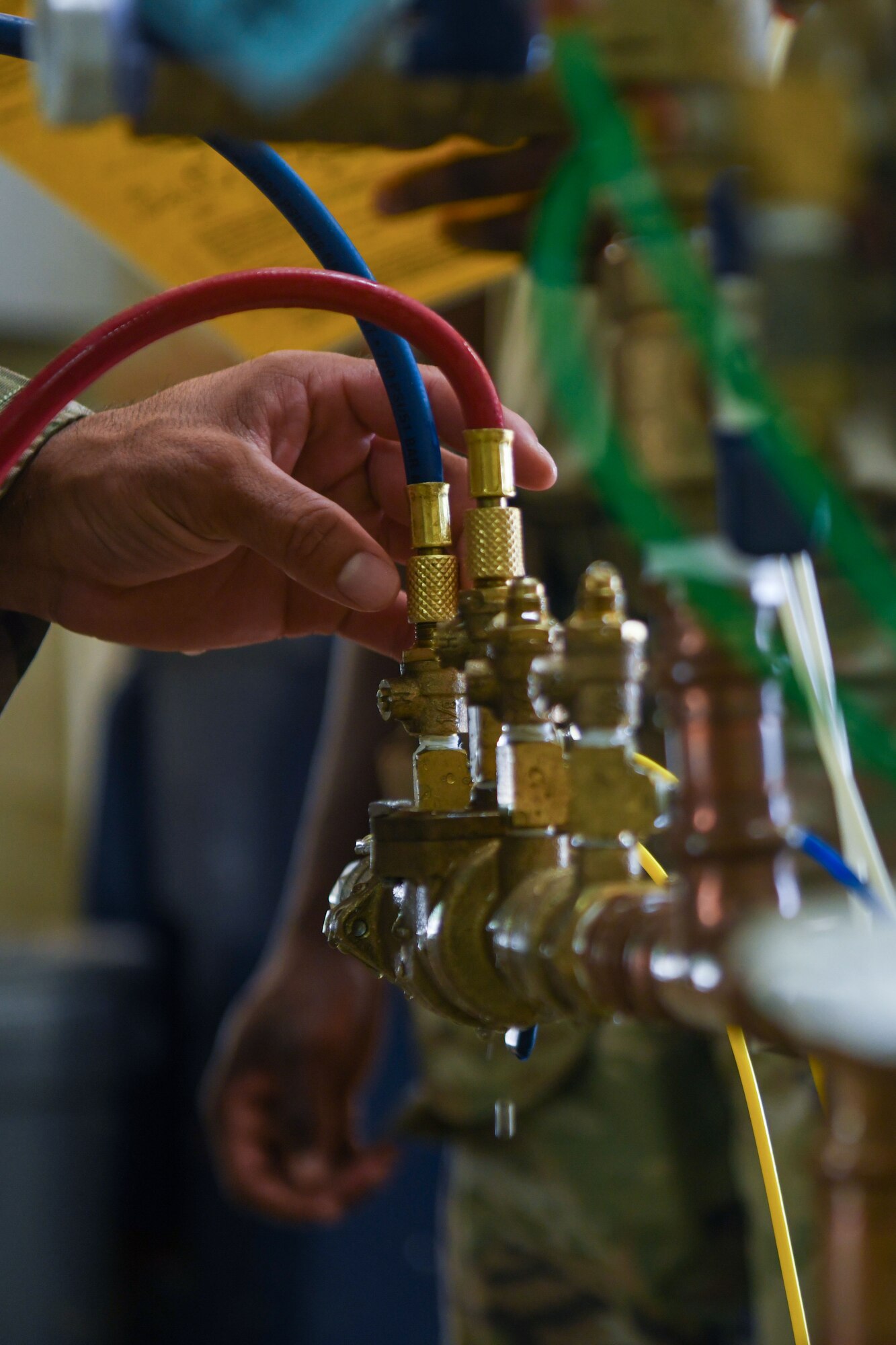A test kit is used to test a backflow prevention device.